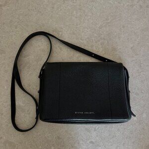 Status Anxiety crossbody bag